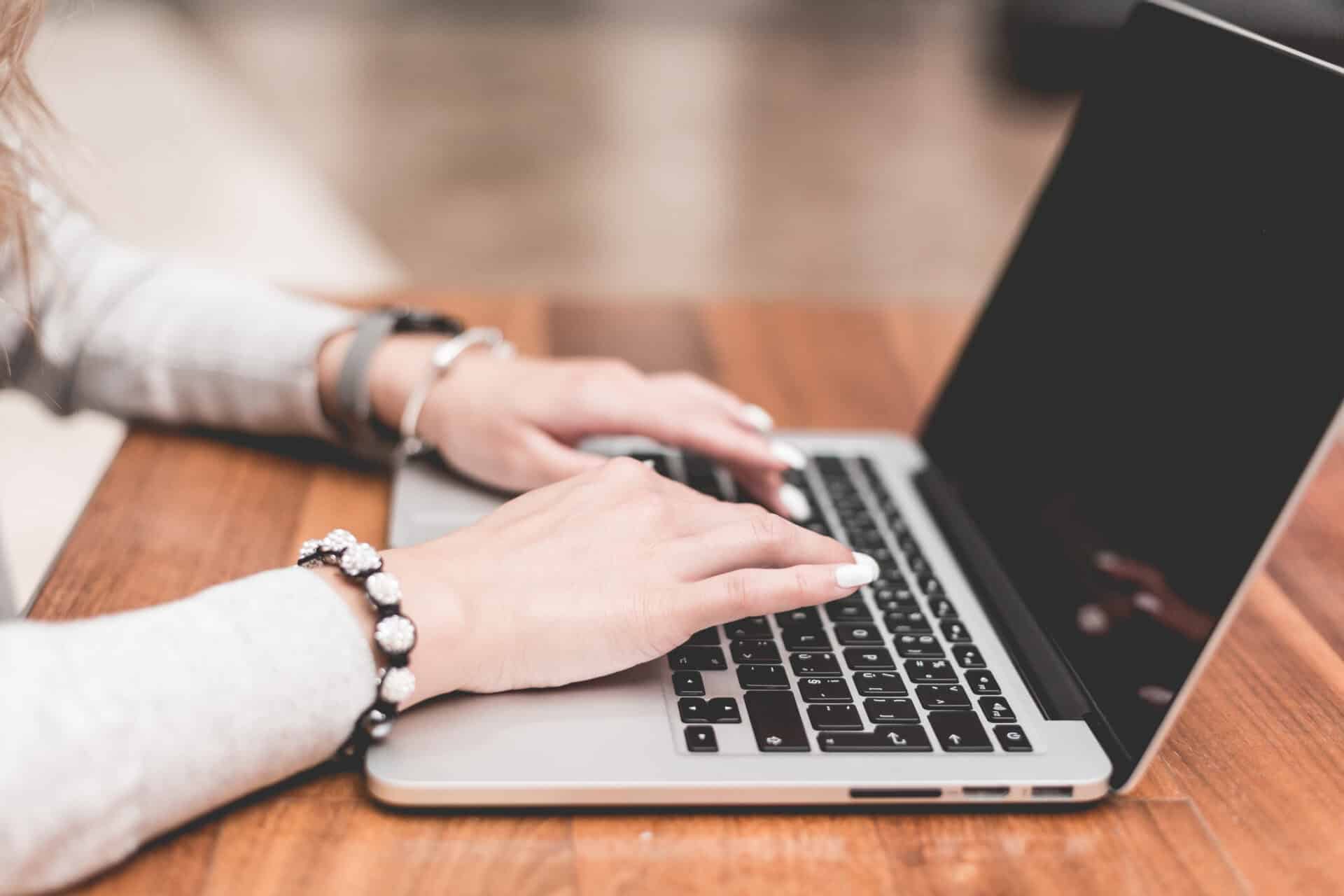 Young Woman Working Typing On Her Laptop Picjumbo Com